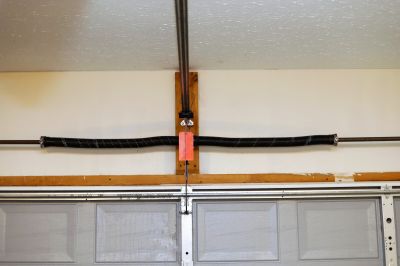 Garage Door Spring Repair And Replacement